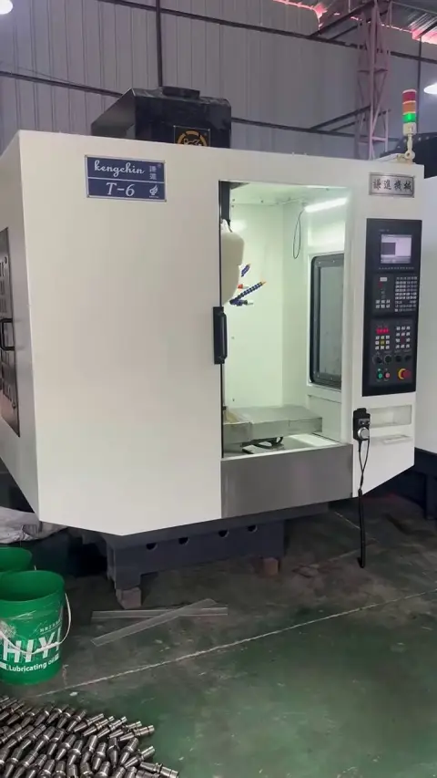 Used Kengchin T 600 Drilling and Tapping Center with Mitsubishi M 70 Control