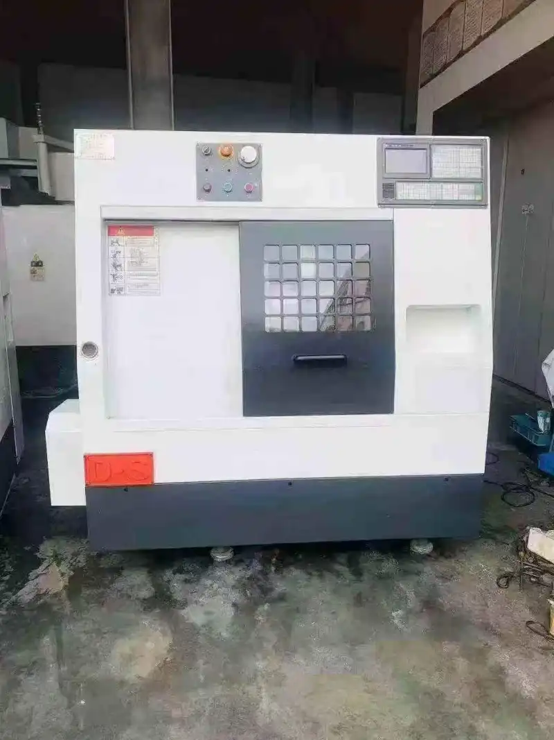 Used Dongbu CXK 320-48-200 Slant-Bed Gang-Type CNC Lathe photo 1