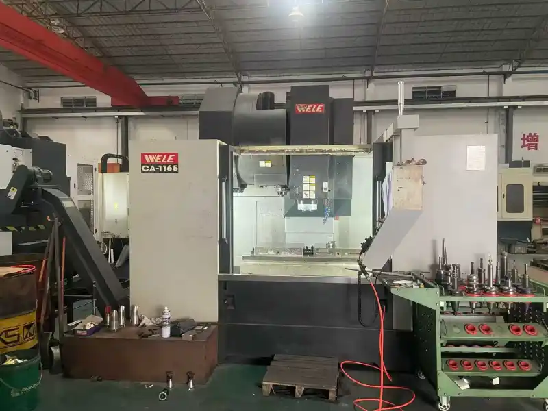 Used WELE 1165 Vertical Machining Center with BT50 Gear Head and FANUC 0i-MF Plus photo 1