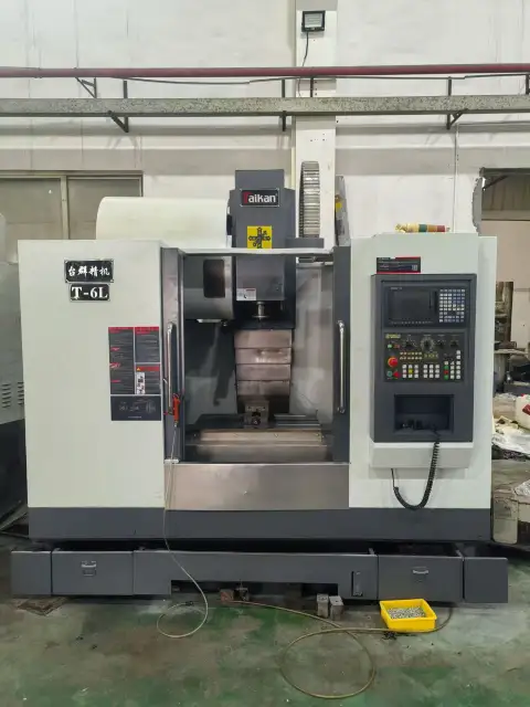 Used 650 L Vertical Machining Center with Mitsubishi M 80 Control and BT40 Spindle